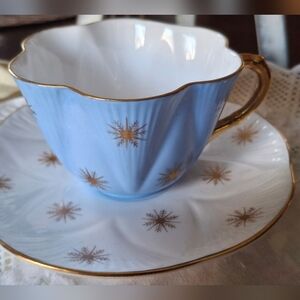 VINTAGE Shelley Dainty Starburst Elegant Blue and White Teacup with Gold Accents